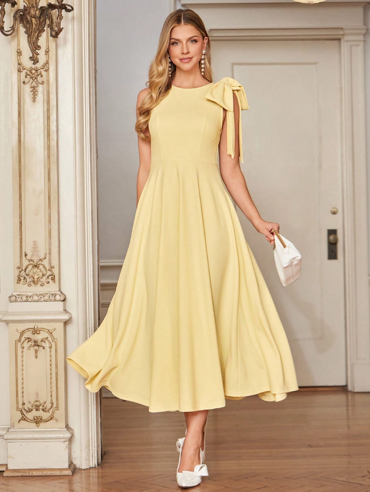 Amorya Abito elegante da donna con scollo tondo, senza maniche, con fiocco in vita e gonna ampia, di colore giallo